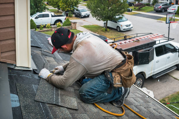 Professional Roofing technician working in Thayer, IN